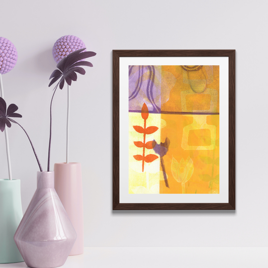 Framed abstract art piece on a wall with decorative vases and flowers.