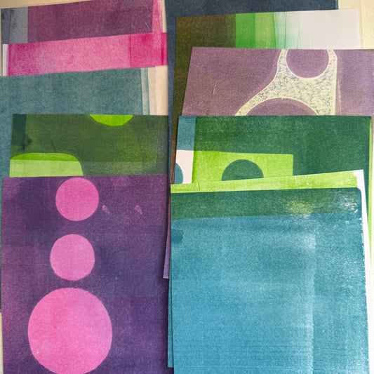 Collection of colorful paper sheets with geometric patterns