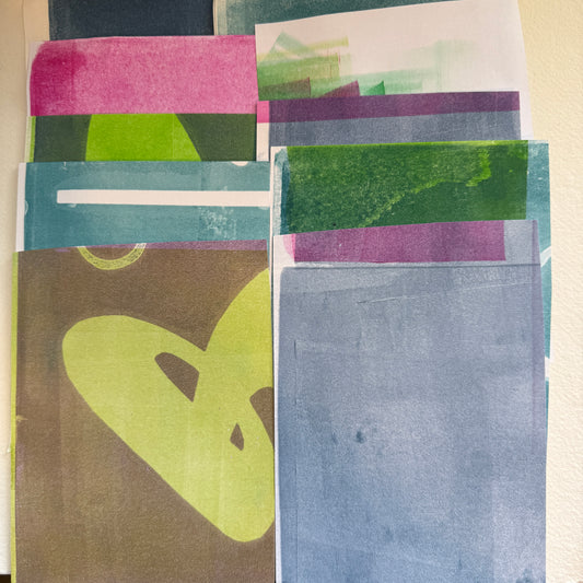 Collection of colorful collage paper arranged vertically