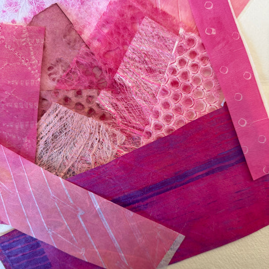 Selection of textured pink and purple paper pieces